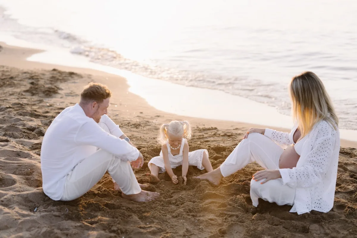 Family photographer in Cyprus — beach session at sunset with a young family
