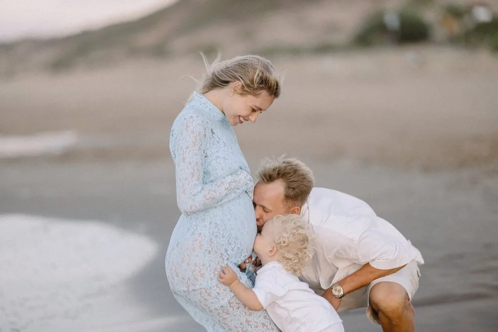 Maternity photographer in Cyprus — outdoor pregnancy photoshoot on a windy day